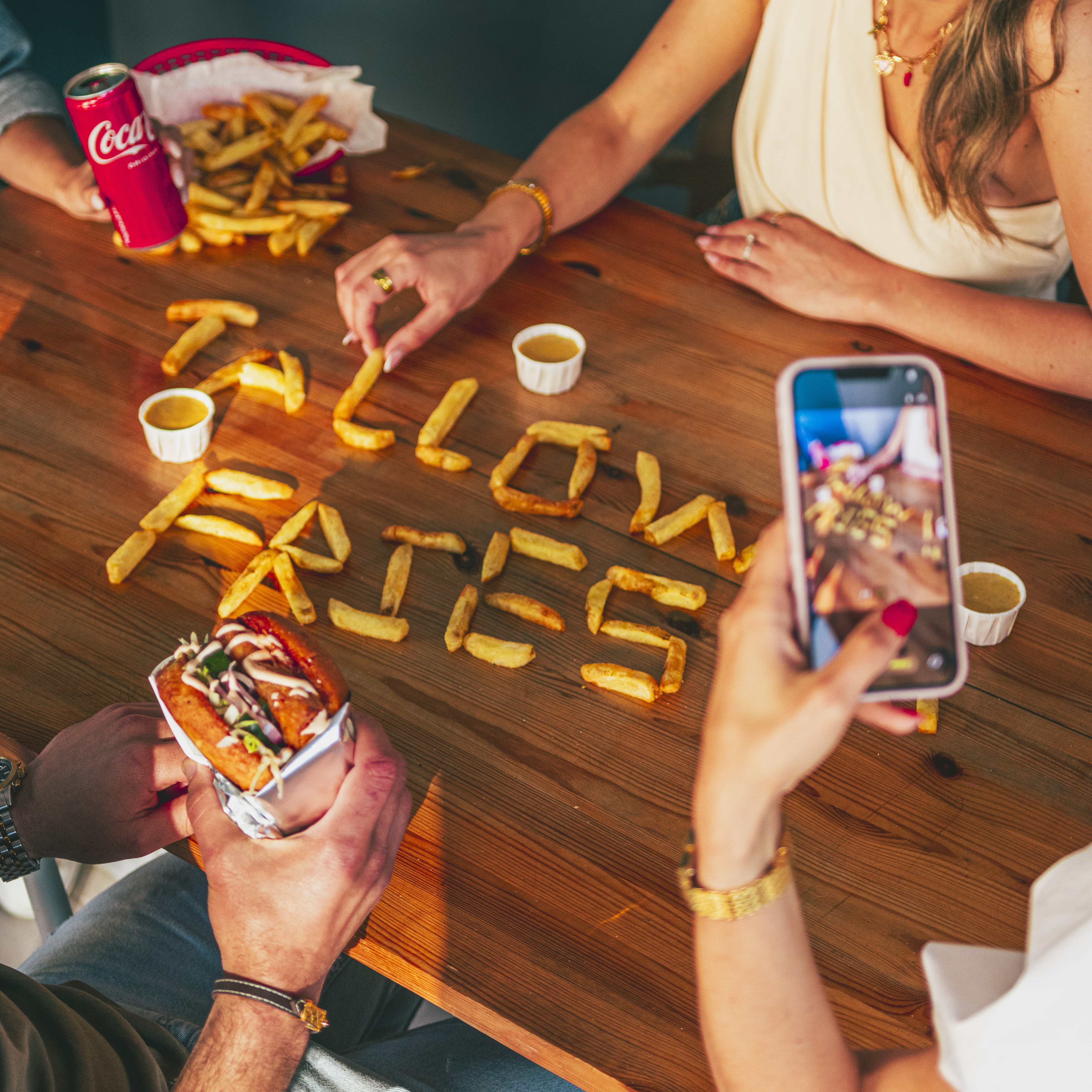 A basket of Hickory Joe's hand-cut Gozo fries with 'Love Fries' branding